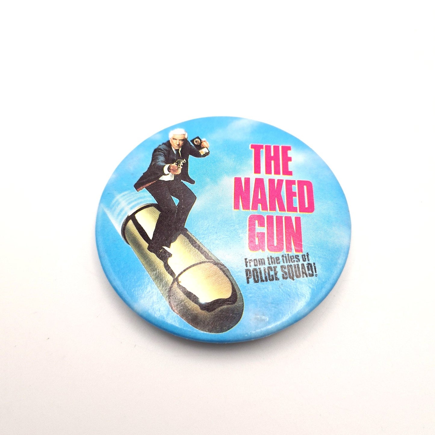 The Naked Gun Retro Badge